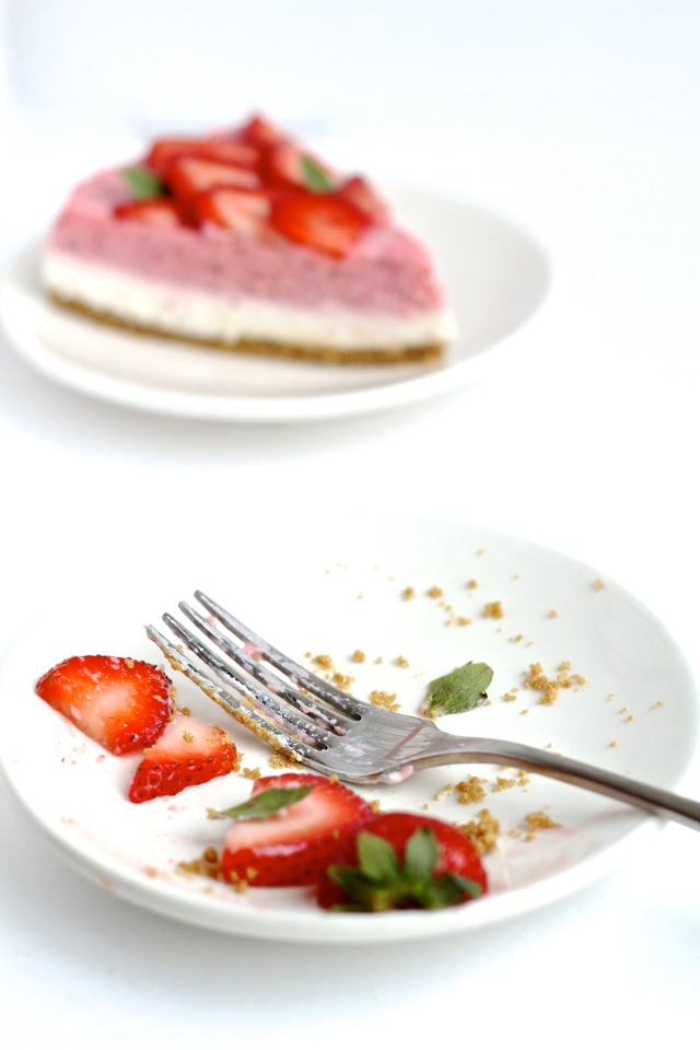 High in protein, low in fat, low in sugar, and roughly 150 calories per slice -- this No Bake Strawberry Cheesecake makes a perfect cool and creamy summer treat! || runningwithspoons.com