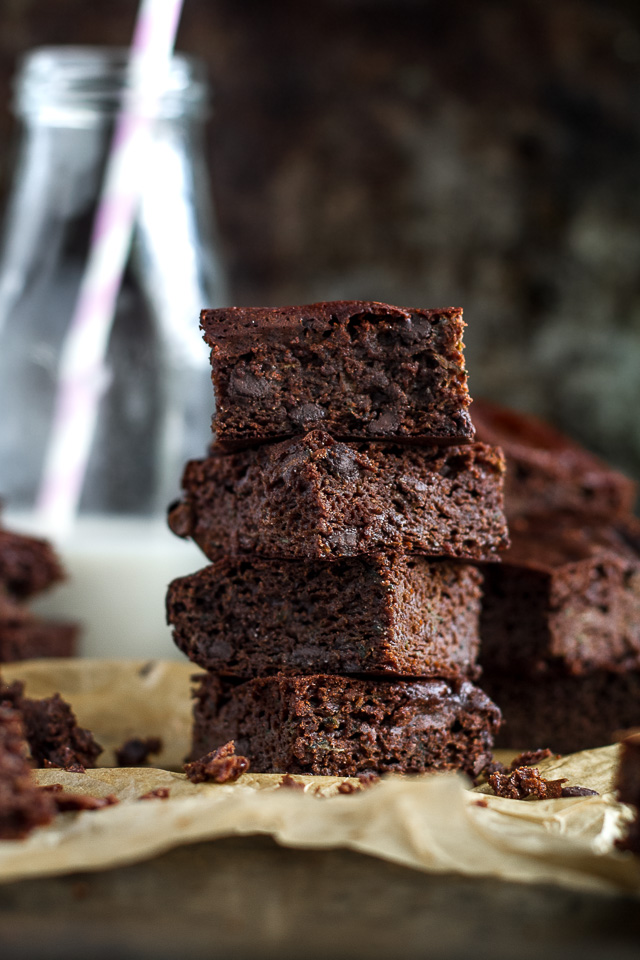 These flourless double chocolate zucchini brownies are gluten-free, grain-free, oil-free, dairy-free, and refined sugar-free, but so tender and chocoately that you’d never be able to tell they're healthy! | runningwithspoons.com