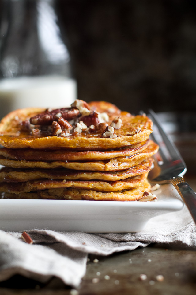 Sweet Potato Greek Yogurt Pancakes that are sure to keep you satisfied all morning with almost 20g of whole food protein! A healthy, easy, and delicious breakfast. | runningwithspoons.com