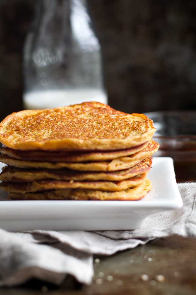 Sweet Potato Greek Yogurt Pancakes that are sure to keep you satisfied all morning with almost 20g of whole food protein! A healthy, easy, and delicious breakfast. | runningwithspoons.com