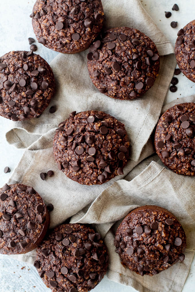 Brownie Batter Breakfast Muffins that are naturally sweetened and loaded with chocolate flavour! They're a deliciously healthy way to start your day or pull out whenever you need a satisfying snack | runningwithspoons.com
