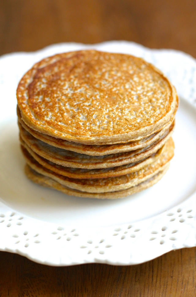 Apple Oat Greek Yogurt Pancakes -- lighty, fluffy, and gluten-free. A quick and easy breakfast that packs over 20g of protein! || runningwithspoons.com #pancakes #breakfast #apple