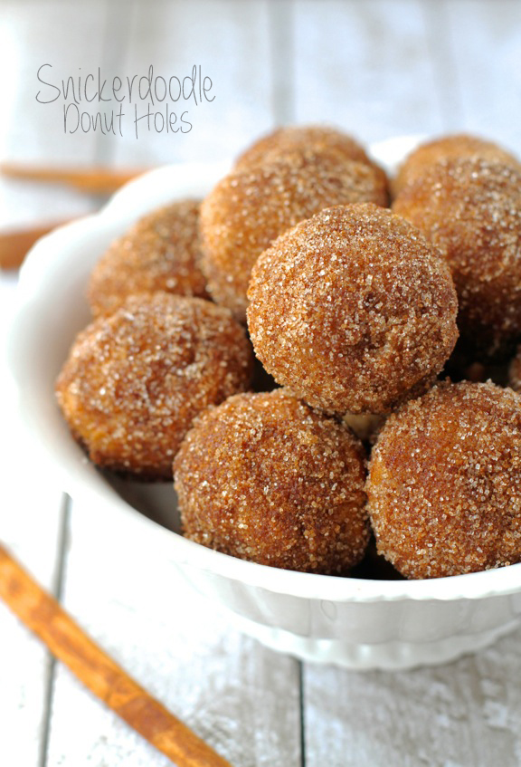 Baked Snickerdoodle Donut Holes -- the goodness of cinnamon and sugar baked into a soft and pillowy donut hole || runningwithspoons.com #snickerdoodle #donuts