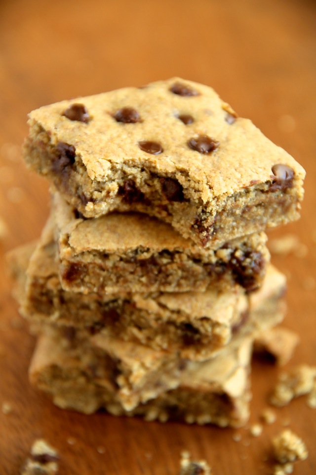 Chocolate Chip Cookie Dough Bars -- these soft and chewy vegan cookie dough bars are naturally sweetened with dates and maple syrup! Healthy and delicious, they're a great way to satisfy those cookie cravings! || runningwithspoons.com