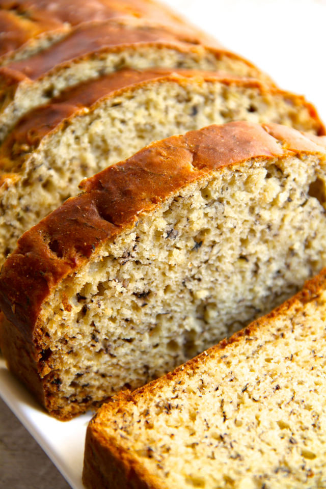 Greek Yogurt Banana Bread -- so soft and tender that you'd never be able to tell it's made without butter or oil! DELICIOUS! || runningwithspoons.com