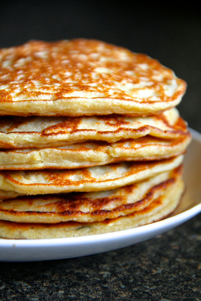 Zucchini Greek Yogurt Pancakes -- light, fluffy, and gluten-free, enjoy the ENTIRE recipe for under 300 calories and 20g of protein! || runningwithspoons.com #glutenfree #breakfast