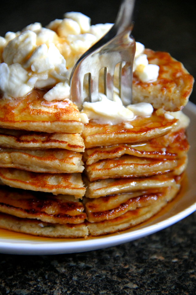 Zucchini Greek Yogurt Pancakes -- light, fluffy, and gluten-free, enjoy the ENTIRE recipe for under 300 calories and 20g of protein! || runningwithspoons.com #glutenfree #breakfast