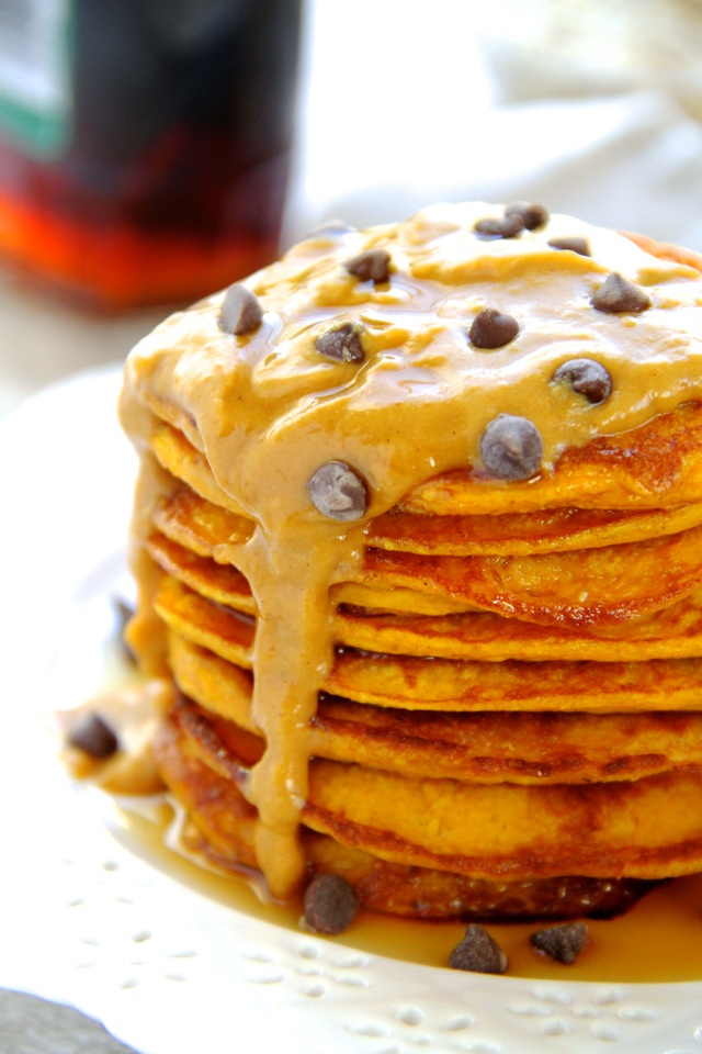 Pumpkin Spice Greek Yogurt Pancakes -- light, fluffy, and made in the blender, enjoy the ENTIRE recipe for under 300 calories with 20g of protein! || runningwithspoons.com #pumpkin #pancakes #breakfast