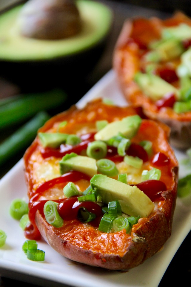 These quick and easy Baked Egg Stuffed Sweet Potatoes are a perfect choice for those nights where you don't have a lot of time or energy to put into cooking. Gluten-free and vegetarian, they make a healthy and balanced meal with minimal hands-on time and no cleanup! || runningwfithspoons.com #vegetarian #glutenfree #healthy #dinner