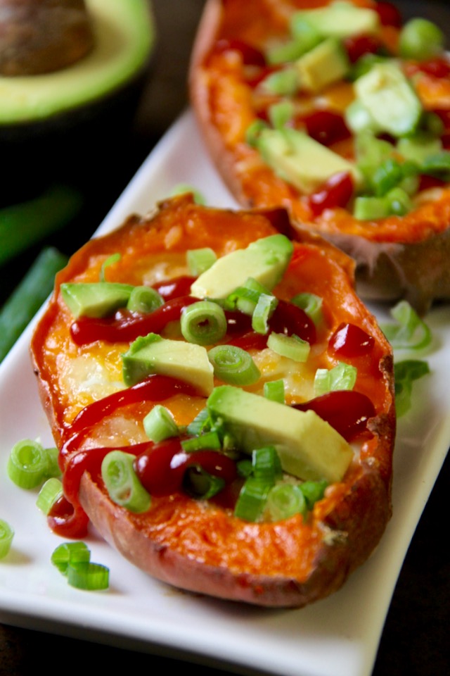 These quick and easy Baked Egg Stuffed Sweet Potatoes are a perfect choice for those nights where you don't have a lot of time or energy to put into cooking. Gluten-free and vegetarian, they make a healthy and balanced meal with minimal hands-on time and no cleanup! || runningwfithspoons.com #vegetarian #glutenfree #healthy #dinner