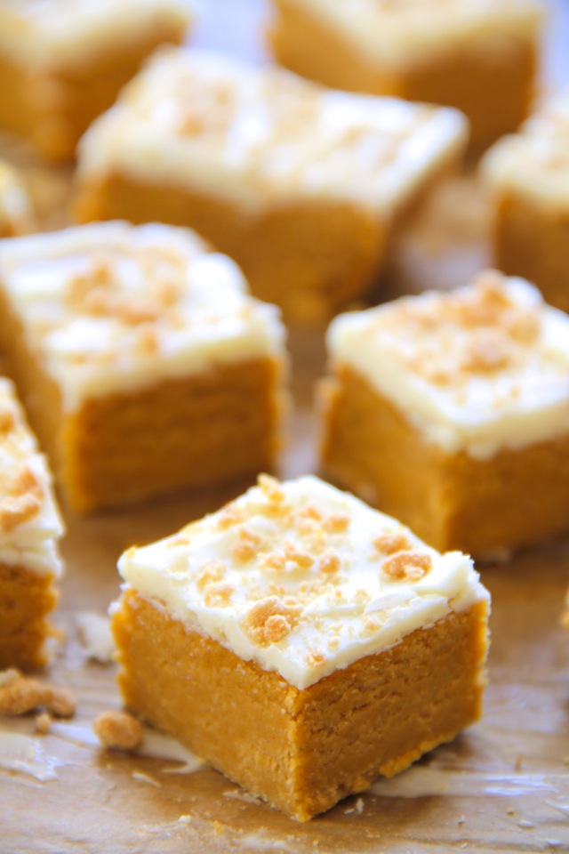 These soft and creamy No Bake Pumpkin Cheesecake Bites combine the tanginess of cheesecake with the spicy sweetness of pumpkin pie. Easily made gluten-free or vegan depending on your dietary needs, they're an irresistible fall treat that everyone will love! || runnningwithspoons.com #pumpkin #cheesecake #nobake