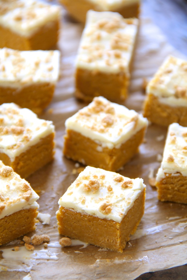 These soft and creamy No Bake Pumpkin Cheesecake Bites combine the tanginess of cheesecake with the spicy sweetness of pumpkin pie. Easily made gluten-free or vegan depending on your dietary needs, they're an irresistible fall treat that everyone will love! || runnningwithspoons.com #pumpkin #cheesecake #nobake