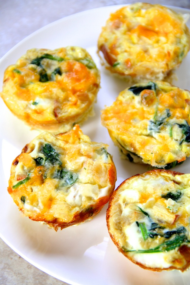 Apple and Gouda Mini Frittatas -- these delicious little egg muffins make a perfect grab-and-go breakfast or a fun brunch! Make ahead and simply pop them in the microwave when you're ready to eat || runningwithspoons.com #breakfast #brunch #eggs
