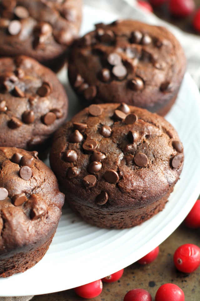 Flourless Double Chocolate Orange Cranberry Muffins -- gluten-free, grain-free, oil-free, dairy-free, refined sugar-free, but so soft and flavourful that you'd never be able to tell they're healthy! || runningwithspoons.com #chocolate #muffins #healthy #Christmas #recipe