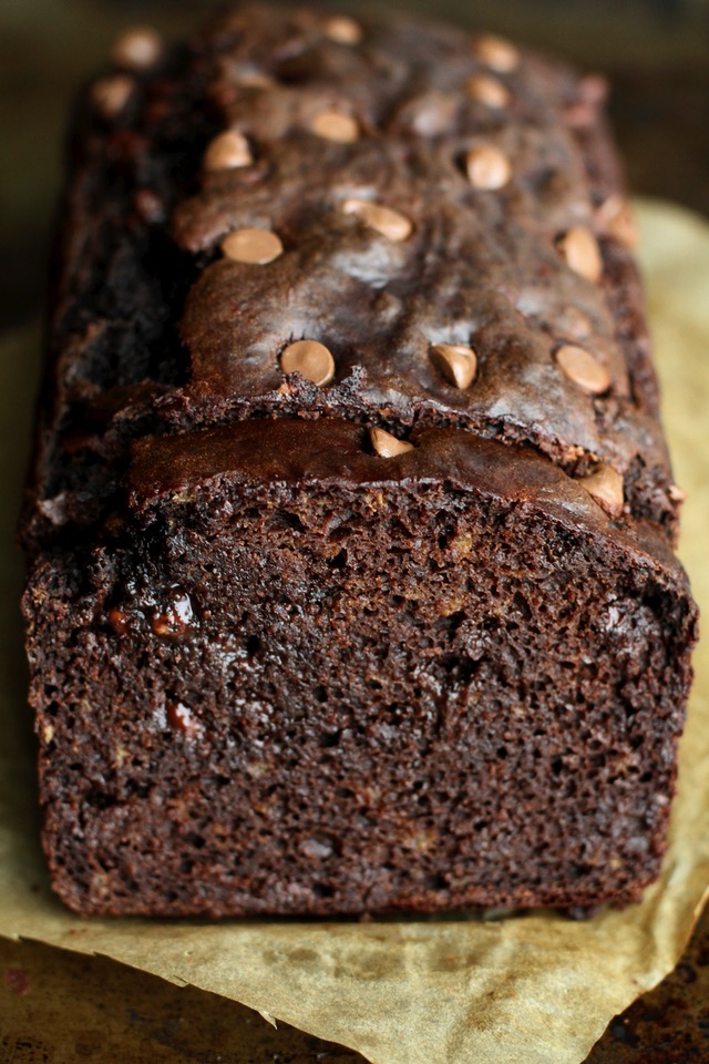 This Double Chocolate Greek Yogurt Banana Bread is LOADED with chocolate flavour, and so soft and tender that you'd never be able to tell it's made with NO butter or oil! || runningwithspoons.com #chocolate #healthy