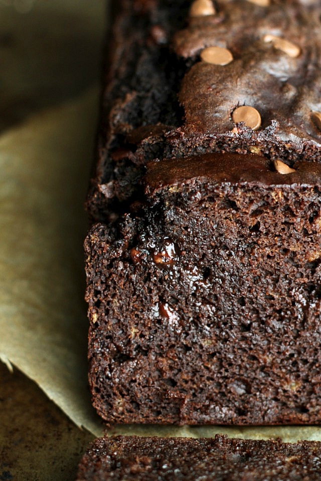 This Double Chocolate Greek Yogurt Banana Bread is LOADED with chocolate flavour, and so soft and tender that you'd never be able to tell it's made with NO butter or oil! || runningwithspoons.com #chocolate #healthy