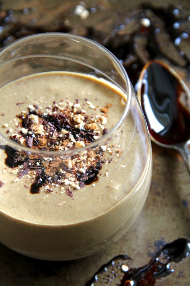 This Warm Gingerbread Breakfast Smoothie is heated on the stovetop post-blending to create a creamy and comforting drink that's packed with fibre, minerals, and plant based protein -- the perfect healthy and delicious breakfast or snack! || runningwithspoons.com #breakfast #smoothie #gingerbread #vegan