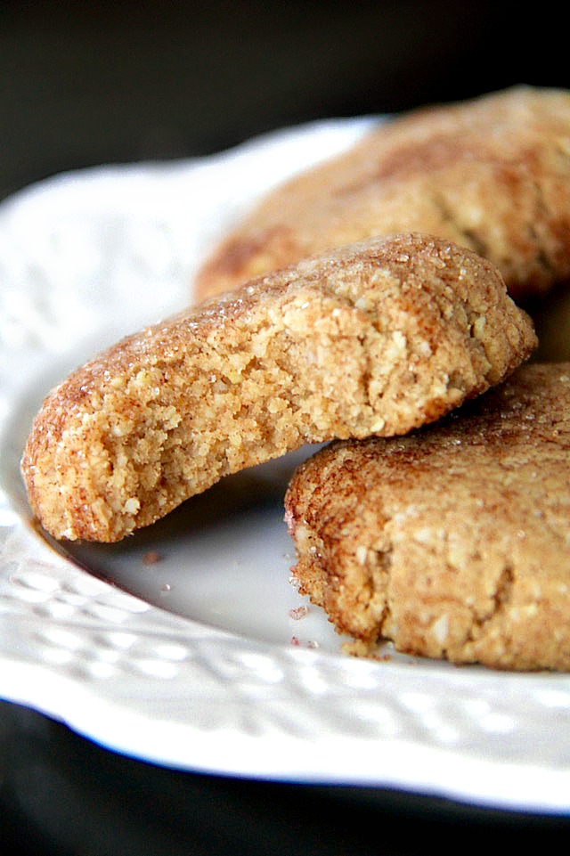 These Grain Free Snickerdoodles have the same soft texture and buttery cinnamon sugar taste of a classic snickerdoodle, but are made without flour, butter, eggs, or refined sugar! | runningwiithspoons.com #vegan #paleo #cookies