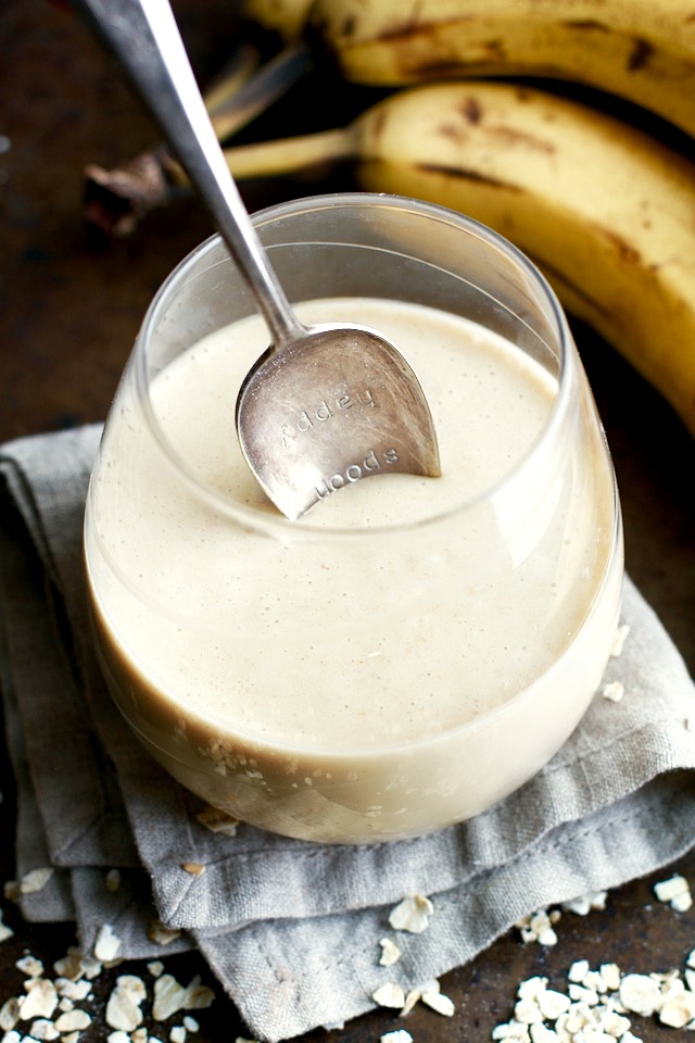 You've never had oatmeal like this before! This thick and creamy Banana Cream Pie Overnight Oatmeal Smoothie combines that stick-to-your-ribs feeling of a bowl of oats with the silky smooth texture of a smoothie! |runningwithspoons.com #vegan #smoothie #healthy #snack