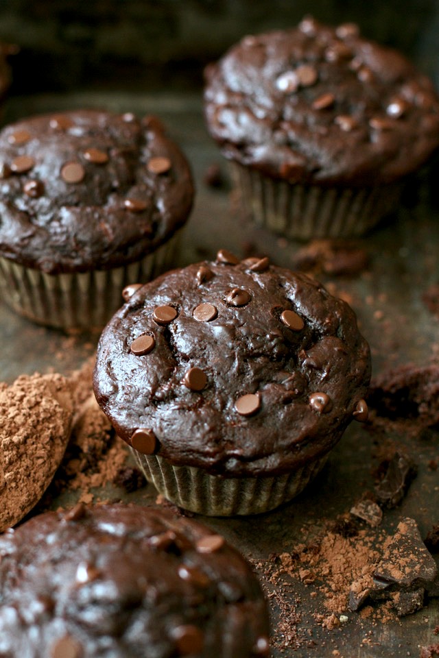 Healthy Double Chocolate Zucchini Muffins - so decadently delicious that you'd never believe they're naturally sweetened and made without any butter or oil! | runningwithspoons.com #recipe #dessert