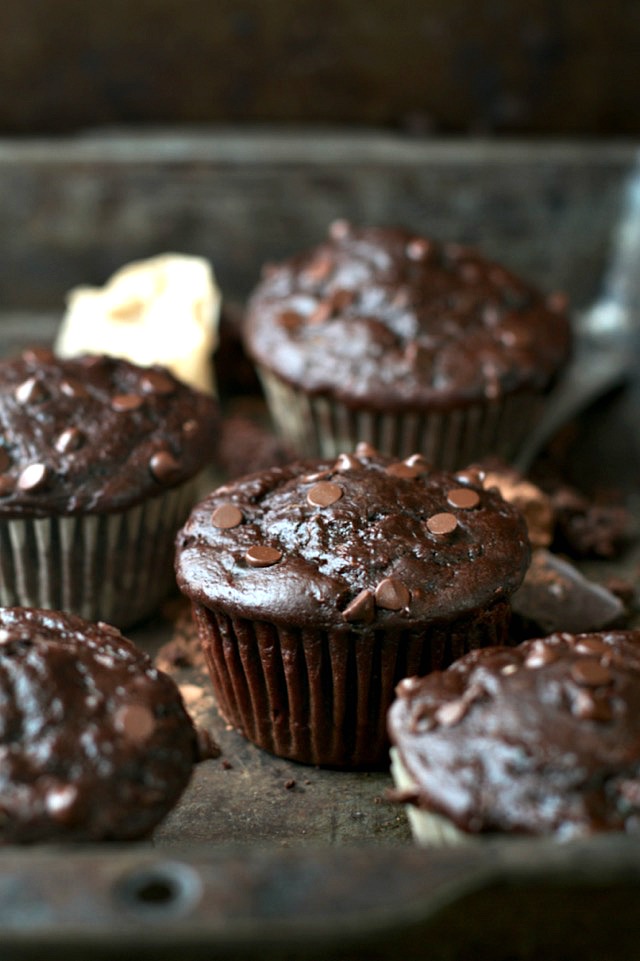 Healthy Double Chocolate Zucchini Muffins - so decadently delicious that you'd never believe they're naturally sweetened and made without any butter or oil! | runningwithspoons.com #recipe #dessert