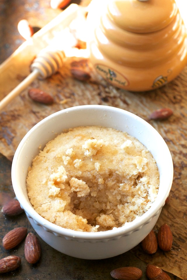 This healthy Honey Almond Oatmeal Mug Cake is made with NO flour, butter, or oil, but so soft and fluffy that you'd never be able to tell! | runningwithspoons.com #recipe #glutenfree #dessert
