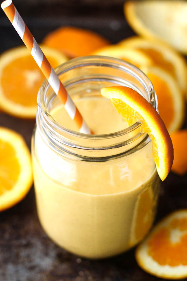 This creamy and refreshing Orange Creamsicle Overnight Oatmeal Smoothie tastes just like a drinkable Creamsicle! Only BETTER because it's vegan, refined-sugar-free, and packed with vitamins! | runningwithspoons.com #healthy #recipe #breakfast