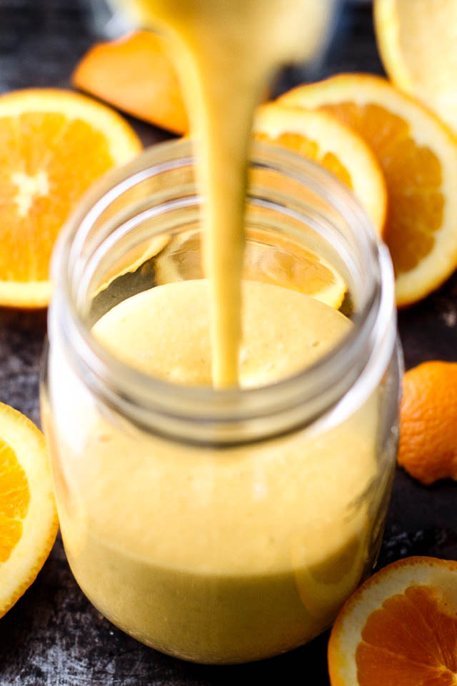 This creamy and refreshing Orange Creamsicle Overnight Oatmeal Smoothie tastes just like a drinkable Creamsicle! Only BETTER because it's vegan, refined-sugar-free, and packed with vitamins! | runningwithspoons.com #healthy #recipe #breakfast