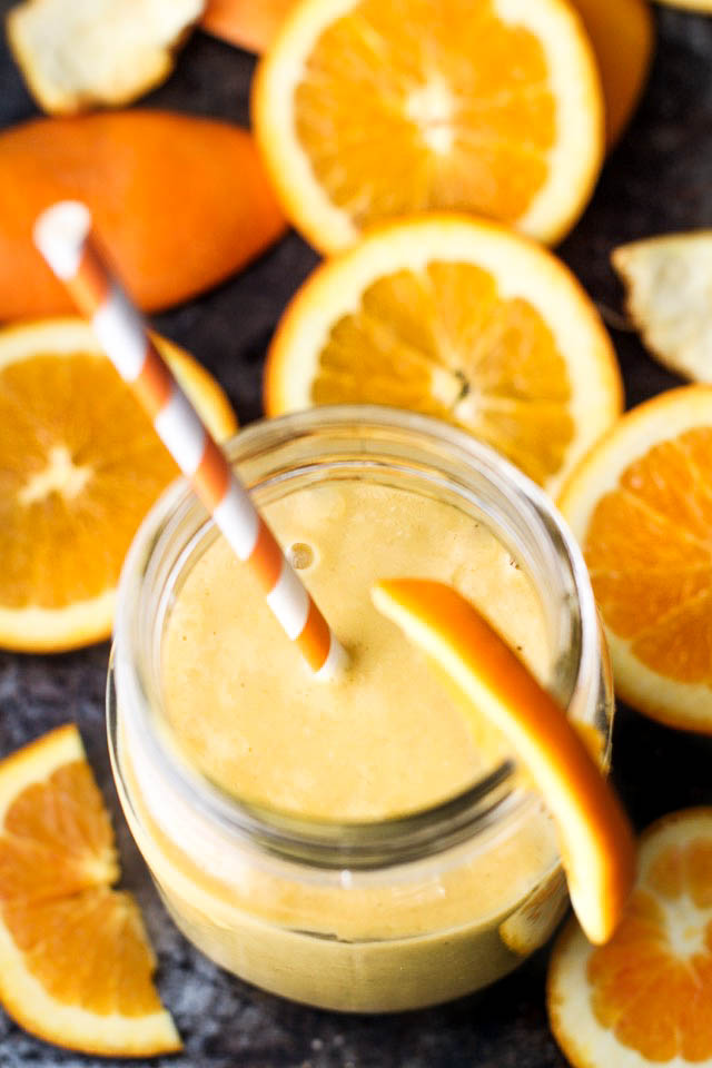 This creamy and refreshing Orange Creamsicle Overnight Oatmeal Smoothie tastes just like a drinkable Creamsicle! Only BETTER because it's vegan, refined-sugar-free, and packed with vitamins! | runningwithspoons.com #healthy #recipe #breakfast