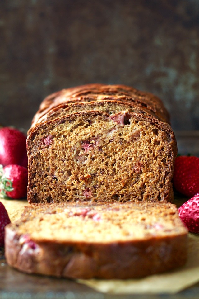 Strawberry Greek Yogurt Banana Bread -- soft, tender, and loaded with strawberries and banana in each bite! You'd never be able to tell it's made without butter or oil! | runningwithspoons.com #recipe #healthy