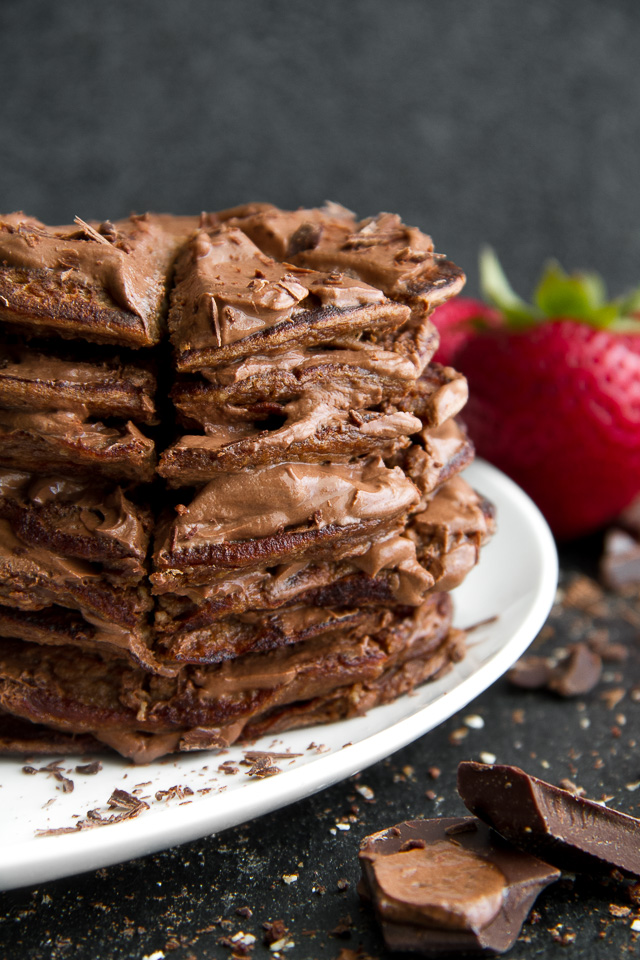 Healthy Double Chocolate Greek Yogurt Pancakes - light, fluffy, and loaded with chocolate flavour! These healthy blender pancakes will keep you satisfied all morning with over 26g of whole food protein. | runningwithspoons.com #recipe #glutenfree #breakfast