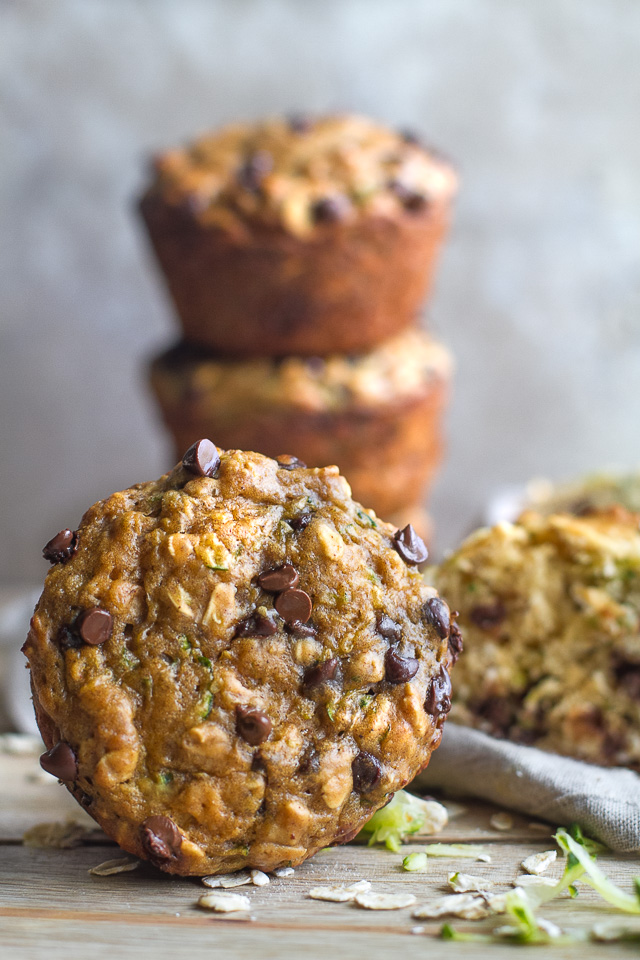 You won't find any butter or oil in these ridiculously soft and tender Zucchini Oat Greek Yogurt Muffins! They're naturally sweetened and perfect for breakfast or healthy snacking. | runningwithspoons.com #recipe #snack #summer