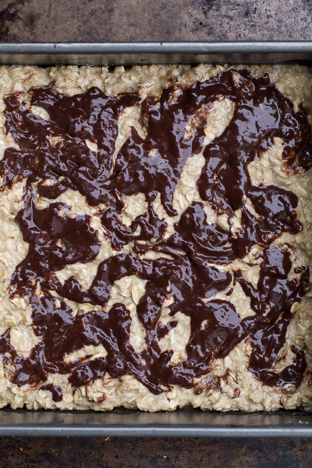 Chocolate Swirl Banana Oat Breakfast Bars - light and fluffy banana oat bars topped with a fudgy chocolate swirl that's healthy enough to enjoy for breakfast! | runningwithspoons.com #recipe #vegan #glutenfree