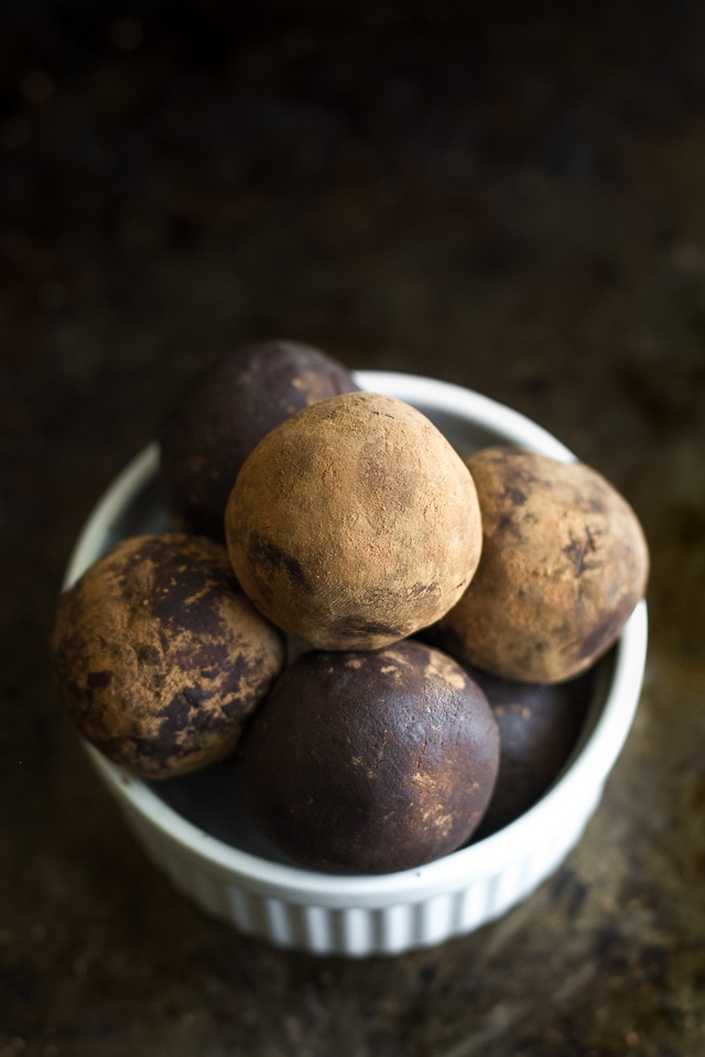 These melt-in-your-mouth No Bake Chocolate Fudge Protein Truffles taste SUPER decadent but are packed with good-for-you ingredients. They're a healthy way to satisfy those chocolate cravings and make a delicious pre or post-workout snack | runningwithspoons.com #recipe #vegan #glutenfree