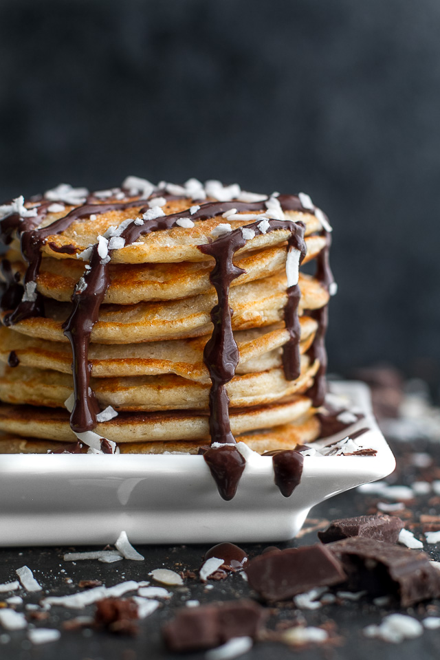 These healthy Almond Joy Greek Yogurt Pancakes are sure to keep you satisfied all morning with over 20g of whole food protein! | runningwithspoons.com