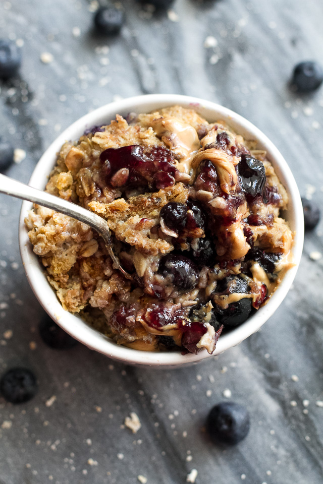 Baked AB&J French Toast Oatmeal - guaranteed to get you out of bed in the morning with it's soft, fluffy, and slightly ooey, gooey texture! This recipe is vegan, easily made gluten-free, and loaded with AB&J (or PB&J) flavour in every bite! | runningwithspoons.com