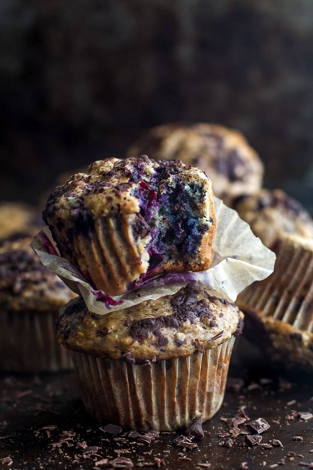 You won't find any butter or oil in these Dark Chocolate Blueberry Banana Oat Muffins! Just plenty of chocolate and blueberry flavour in a healthy soft and tender banana oat muffin | runningwithspoons.com