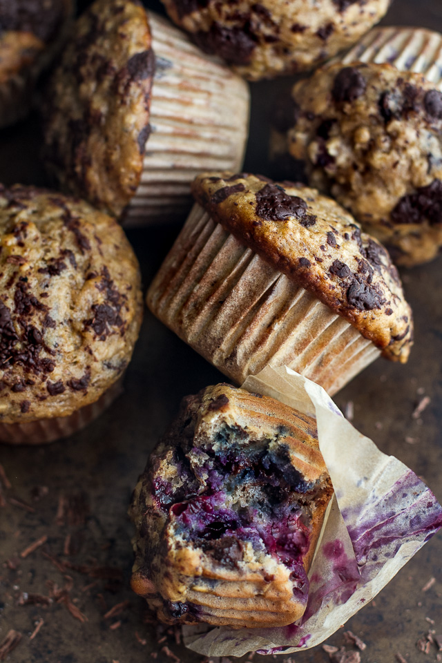 You won't find any butter or oil in these Dark Chocolate Blueberry Banana Oat Muffins! Just plenty of chocolate and blueberry flavour in a healthy soft and tender banana oat muffin | runningwithspoons.com