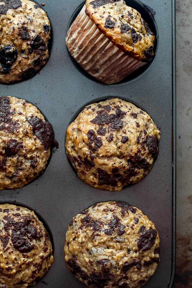 You won't find any butter or oil in these Dark Chocolate Blueberry Banana Oat Muffins! Just plenty of chocolate and blueberry flavour in a healthy soft and tender banana oat muffin | runningwithspoons.com