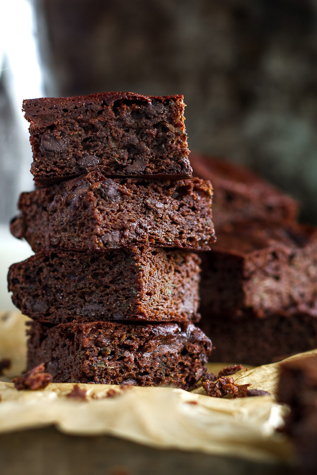 These flourless double chocolate zucchini brownies are gluten-free, grain-free, oil-free, dairy-free, and refined sugar-free, but so tender and chocoately that you’d never be able to tell they're healthy! | runningwithspoons.com