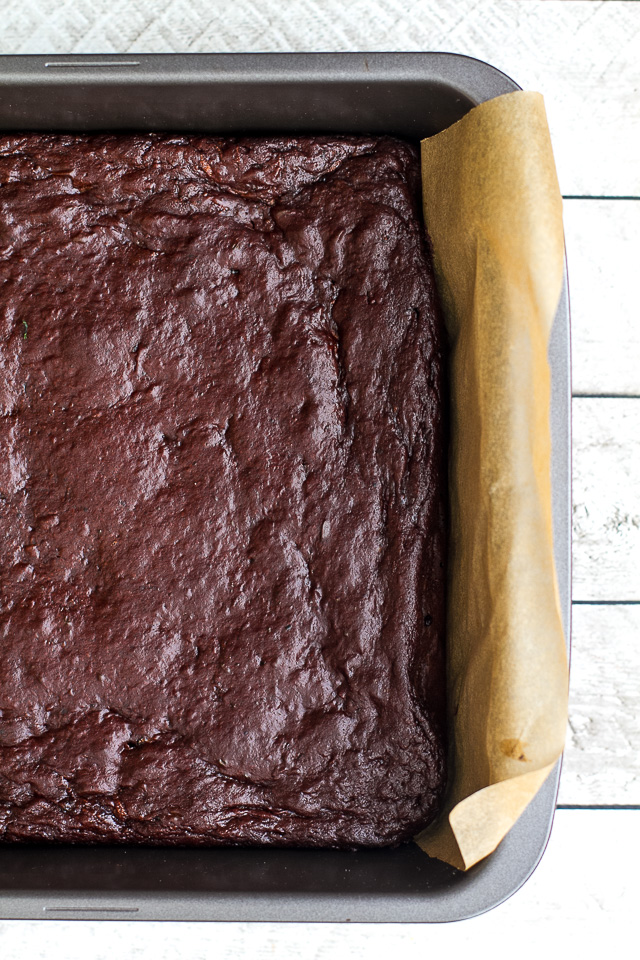 These flourless double chocolate zucchini brownies are gluten-free, grain-free, oil-free, dairy-free, and refined sugar-free, but so tender and chocoately that you’d never be able to tell they're healthy! | runningwithspoons.com