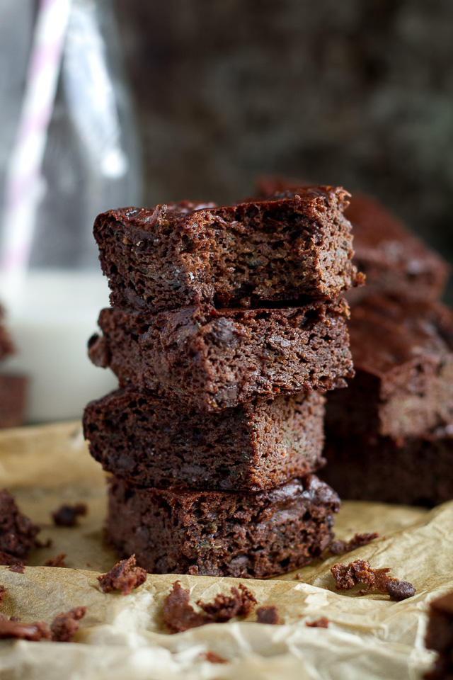 These flourless double chocolate zucchini brownies are gluten-free, grain-free, oil-free, dairy-free, and refined sugar-free, but so tender and chocoately that you’d never be able to tell they're healthy! | runningwithspoons.com