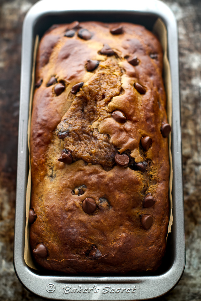 This One Bowl Greek Yogurt Pumpkin Bread recipe is made without butter, oil, or refined sugar, but so tender and flavourful that you’d never be able to tell it's healthy! | runningwithspoons.com