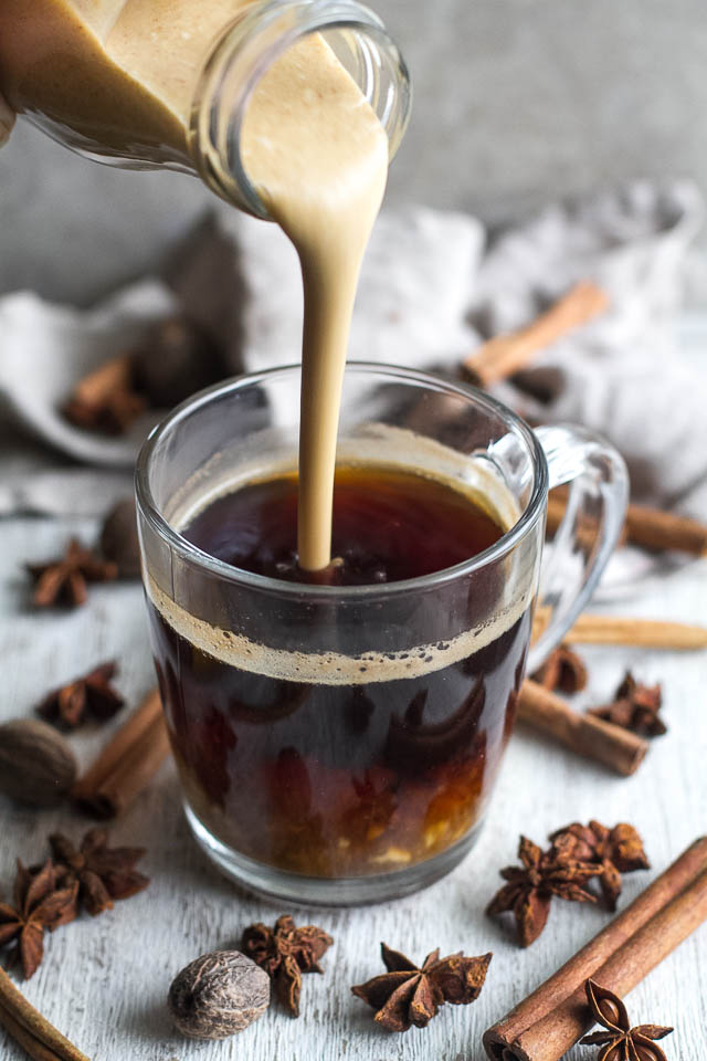 This naturally sweetened, Dairy Free Pumpkin Spice Coffee Creamer is a healthy alternative to store-bought creamers! It's vegan, paleo-friendly, refined-sugar-free, and tastes AMAZING! | runningwithspoons.com