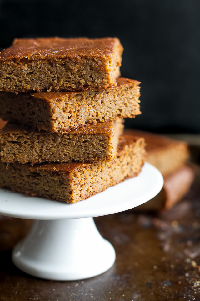 These flourless pumpkin pie bars are so tender and fudgy that you'd never know they're 100% healthy and made with NO flour, butter, oil, or refined sugar! | runningwithspoons.com