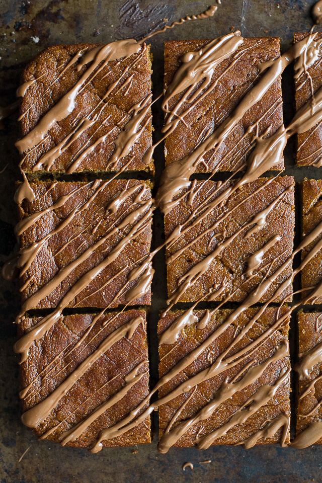 These flourless pumpkin pie bars are so tender and fudgy that you'd never know they're 100% healthy and made with NO flour, butter, oil, or refined sugar! | runningwithspoons.com