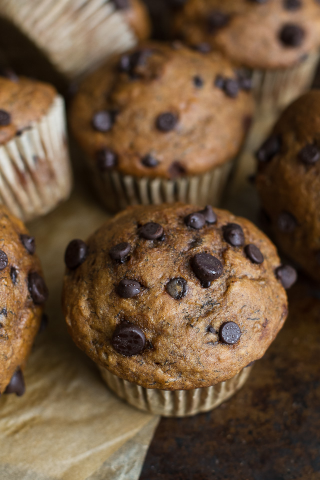 One Bowl Pumpkin Banana Muffins to help you use up overripe bananas and leftover canned pumpkin! Not quite pumpkin muffins, not quite banana muffins, they combine hints of both to create healthy muffins that are naturally sweetened and loaded with flavour | runningwithspoons.com