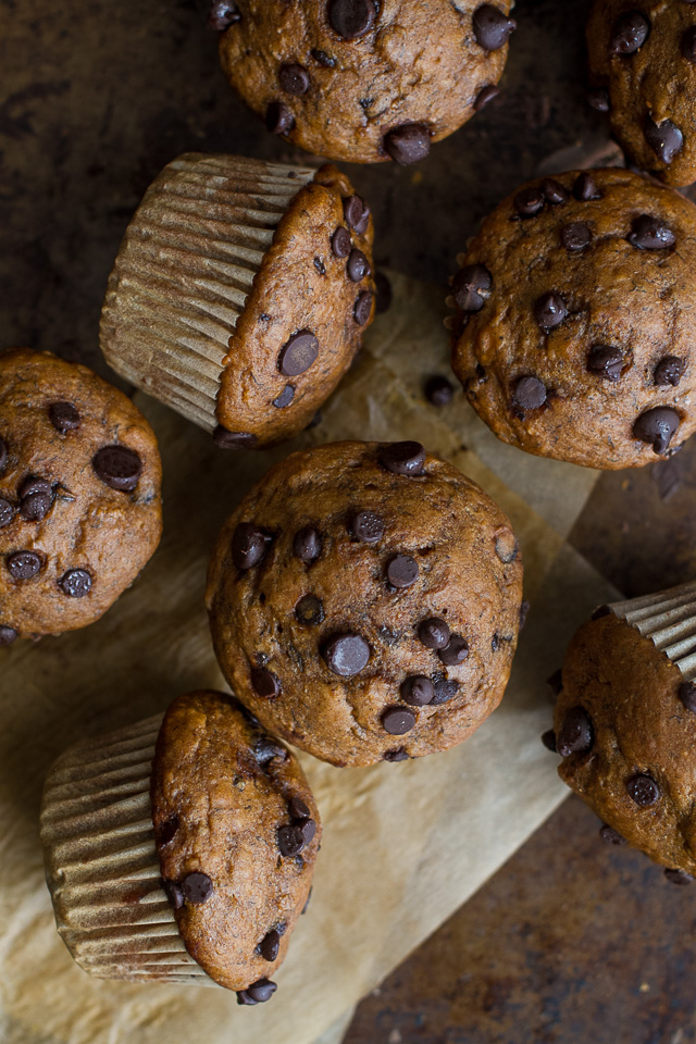 One Bowl Pumpkin Banana Muffins to help you use up overripe bananas and leftover canned pumpkin! Not quite pumpkin muffins, not quite banana muffins, they combine hints of both to create healthy muffins that are naturally sweetened and loaded with flavour  | runningwithspoons.com