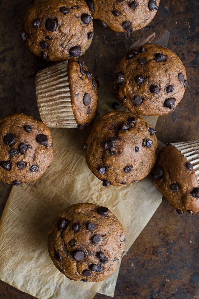 One Bowl Pumpkin Banana Muffins to help you use up overripe bananas and leftover canned pumpkin! Not quite pumpkin muffins, not quite banana muffins, they combine hints of both to create healthy muffins that are naturally sweetened and loaded with flavour  | runningwithspoons.com