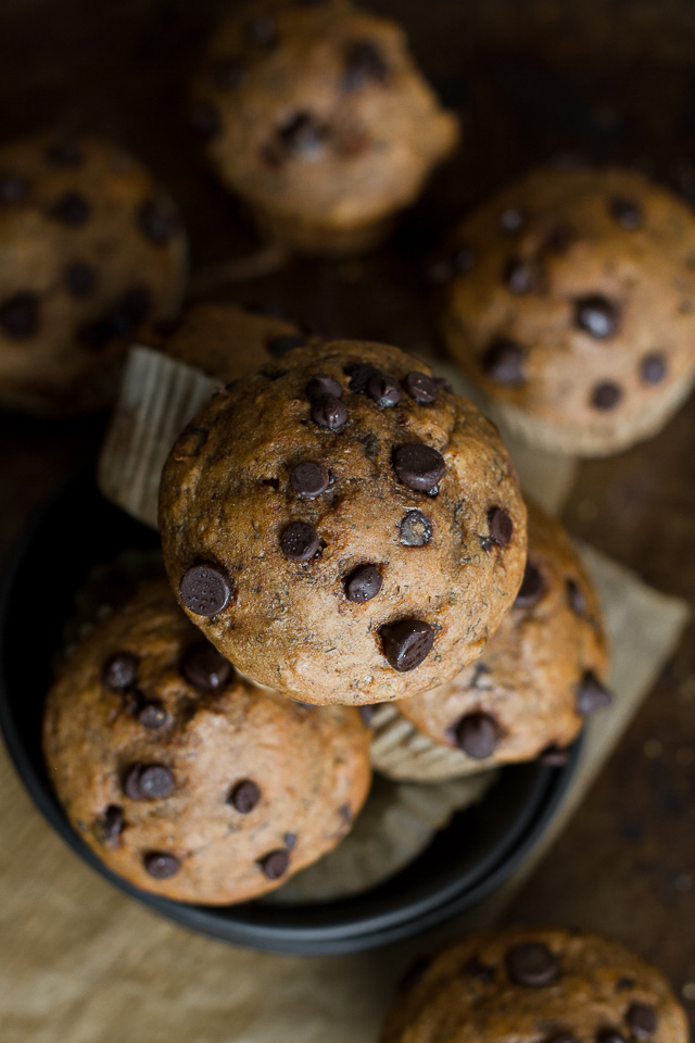 One Bowl Pumpkin Banana Muffins to help you use up overripe bananas and leftover canned pumpkin! Not quite pumpkin muffins, not quite banana muffins, they combine hints of both to create healthy muffins that are naturally sweetened and loaded with flavour  | runningwithspoons.com